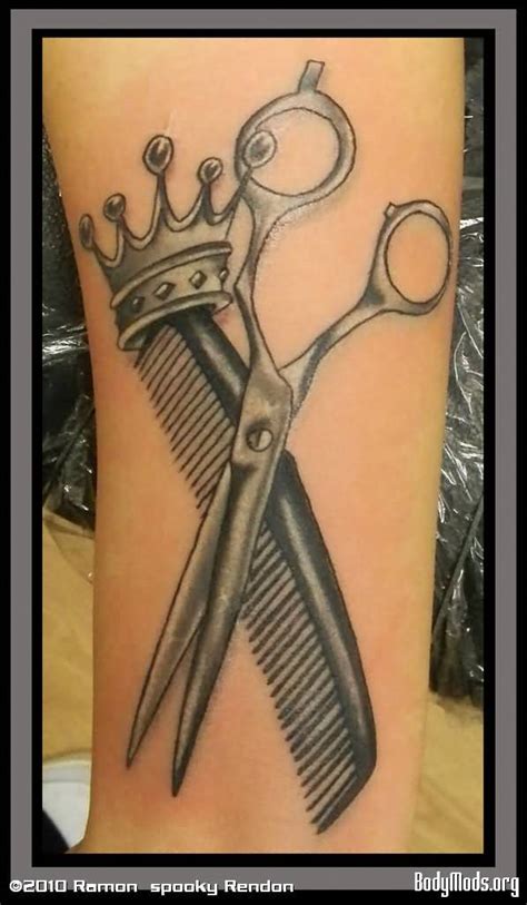Grey Ink Crowned Comb And Scissor Tattoo Design