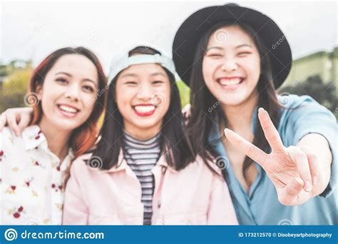 Asian Young Women Friends Having Fun Outdoor Happy Trendy Girls