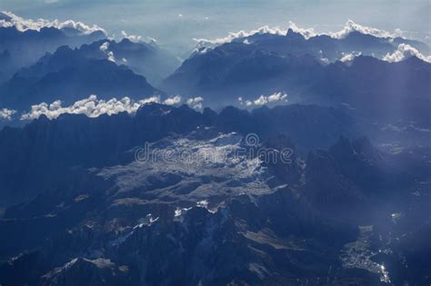 Aerial View Of Misty Mountains Lake And Clouds Above The Mountain