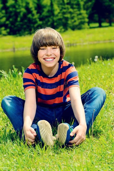 Boy Sitting On Grass Stock Image Image Of Clothes Laugh 120156825