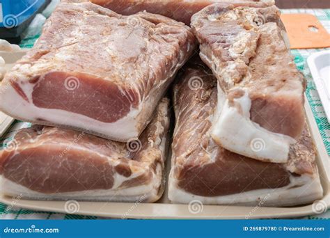 Large Chunks Of Fresh Salted Pork Bacon On A Village Market Stall