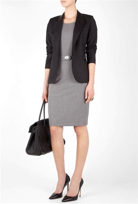 A Business Dress Paired With A Fitted Black Blazer Is A Great Look For