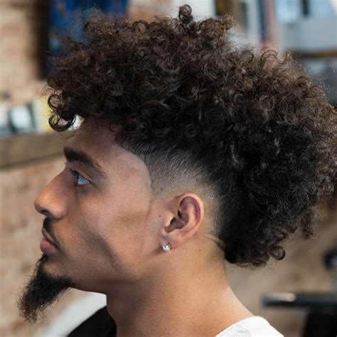 To grow an afro, you need plenty of curl length. Types of Fade Haircuts - Men's Hairstyle Trends
