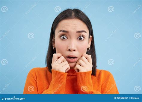 Close Up Of Shocked Scared Brunette Girl Looking Frightened And