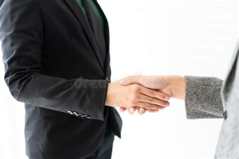 Young Businessman Shakes Hands And Agrees To Cooperate In Business