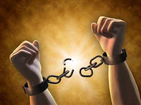 Hands Breaking Chains Stock Photos Pictures And Royalty Free Images Istock