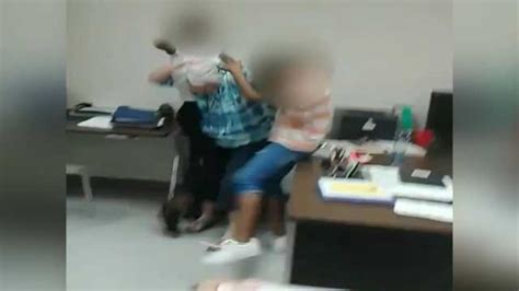 Video Middle School Teacher Repeatedly Slapped During Fight Between