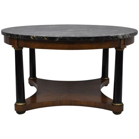 Pairing marble with an antique metal framework, the airy, simplified profile of this coffee table is great for small spaces. Antique Round Marble-Top Empire Style Coffee Table ...