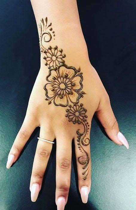 18 Beautiful Henna Tattoo Designs To Try Henna Tattoo Designs Simple