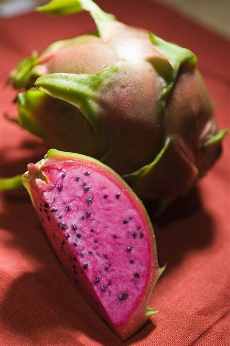 Complete with bright pink skin and green scales, dragon fruit dragon fruit, which is also known as strawberry pear or pitaya, is a tropical fruit that grows on a. Ever tried a Dragon Fruit? | Frieda's Inc. - The Specialty ...