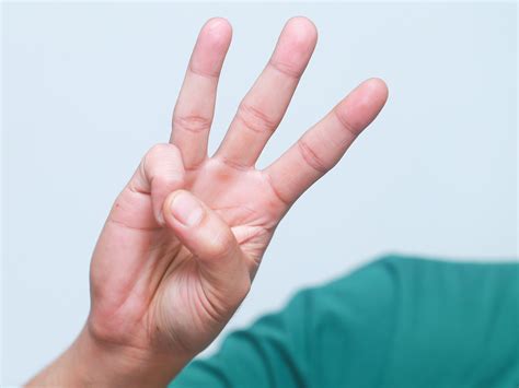 Your first two fingers tap the top of your other two fingers. How to Say Your Name in Sign Language: 11 Steps (with ...