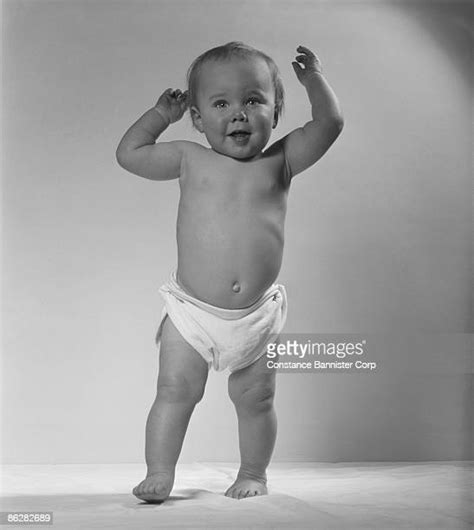 Baby Standing Diaper Photos And Premium High Res Pictures Getty Images