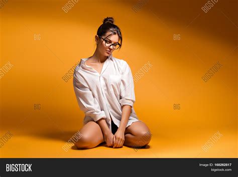Woman Sitting On Knees Pose Deondees Wallpaper