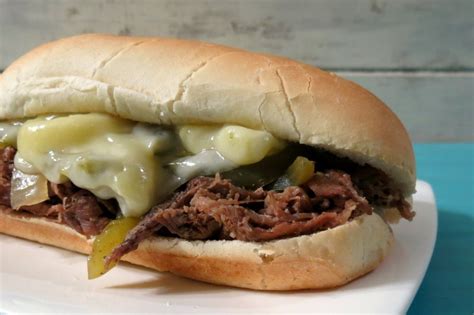 Spray your crock pot with pam cut the beef round steak into thin slices and brown just a minute in a pan add green pepper, onion, stock, garlic salt, pepper and dressing mix to the crock pot and cover cook on low for 8 hours Lightened Up Philly Cheese Steak (Crock-Pot) / Giveaway
