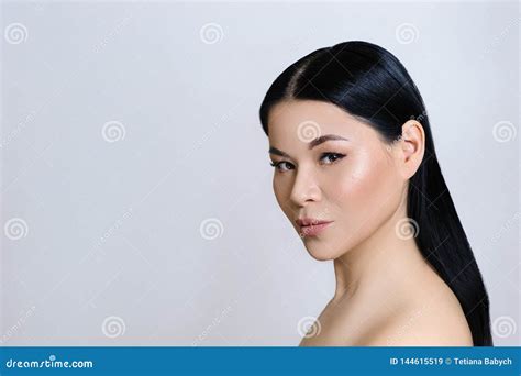 Beautiful Asian Woman Face With Clean Fresh Skin Nude Makeup
