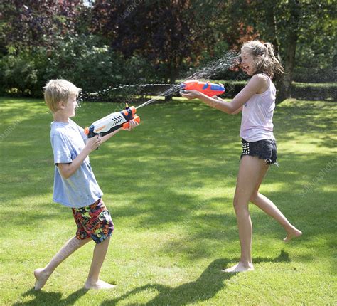 brother and sister play fighting stock image f009 3237 science photo library