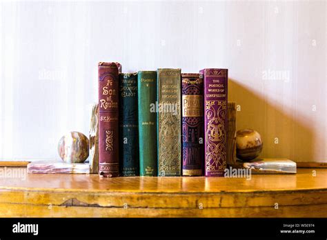 Old Hardcover Books With Ornate Gold Foil Print On The Spines Eltham