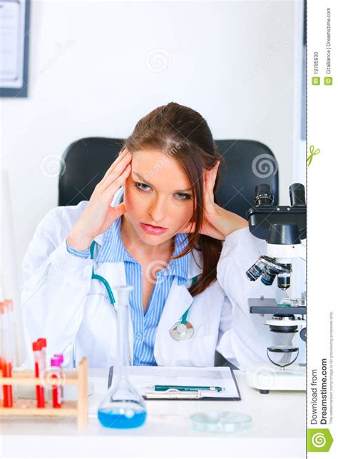 Shocked Medical Doctor Woman Sitting At Table Stock Photo Image Of Analysis Indoors
