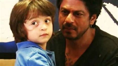 shah rukh khan s latest picture with son abram gives a glimpse of their playfulness on set