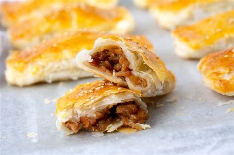 A quirky variation on conventional pulled pork sees it prepared from braised pork shoulder chops before being incorporated in puff pastry pasties with chinese bbq sauce. BBQ Pork Puffs (Char Siu So) | Asian Inspirations