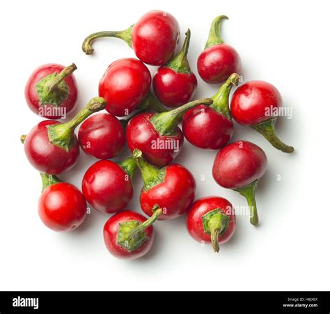 Round Red Chili Peppers Isolated On White Background Stock Photo Alamy