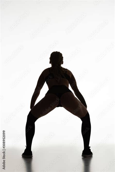 Back View Of Silhouette Of Sexy Girl Twerking Isolated On White Stock Photo Adobe Stock