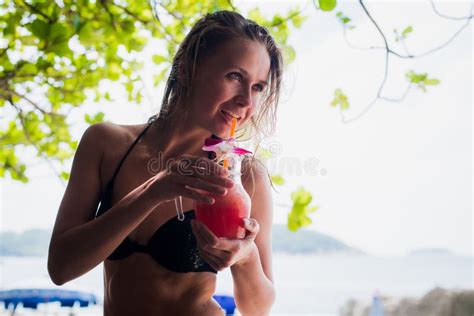 Sport Fitness Woman Drinking Healthy Pink Detox Juice Vegetable Smoothie On The Beach Summer