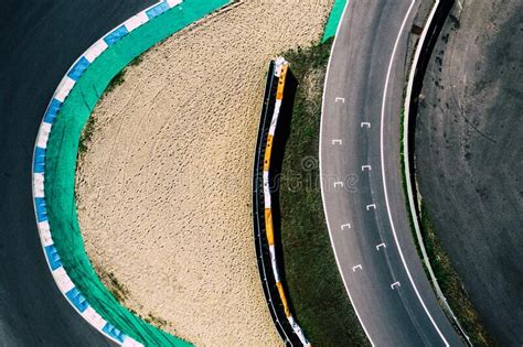 Aerial Top Down Drone View Of A Racing Track With Tight Turns And