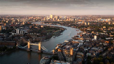 London View Of Tower Bridge River Thames And Canary Wharf England Uk