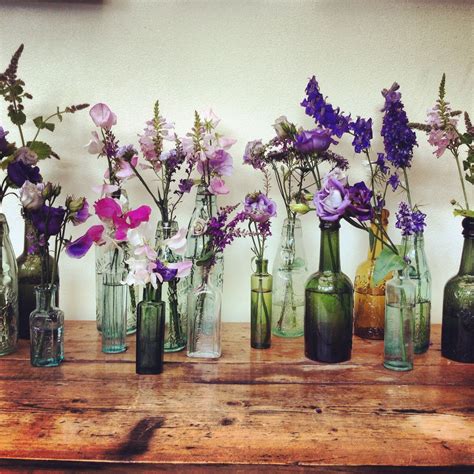 Assorted Sized Vintage Glass Bottles For Wild Flower Arrangments