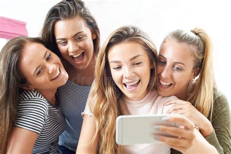Group Of Teenage Girls Taking Selfie On Mobile Phone Stock Image Image Of Female Friends