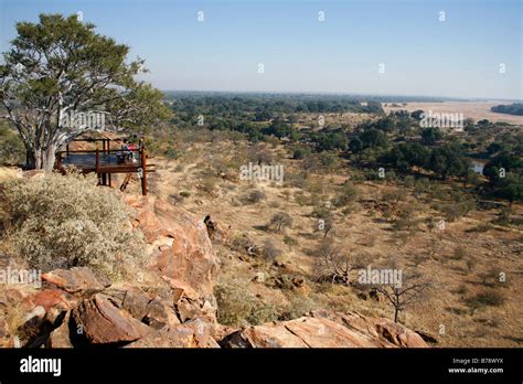 Tourists On A Viewing Deck Overlooking The Confluence Of The Shashe And