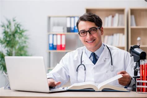 The Young Doctor Studying Medical Education Stock Photo Image Of