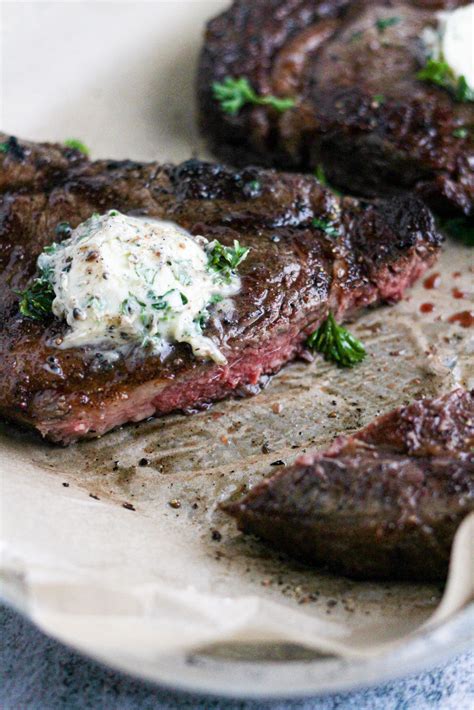 Grilled Ribeye Steak With A Garlic Herb Compound Butter The Buttered