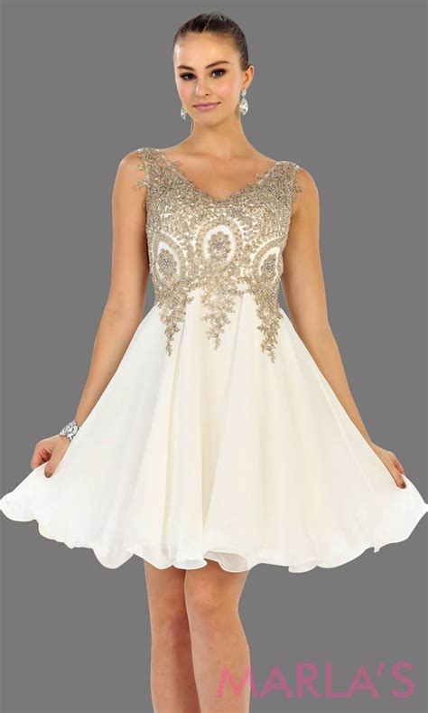 Short Flowy White Dress With Gold Lace Detail On The Bodice This Is A
