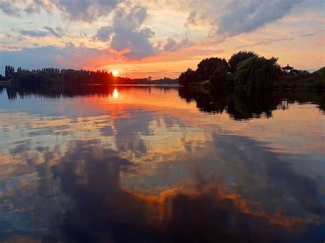 Free Photo Sunset Lake Water Reflection Clouds Atmospheric
