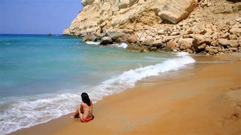 Woman On Nudist Beach