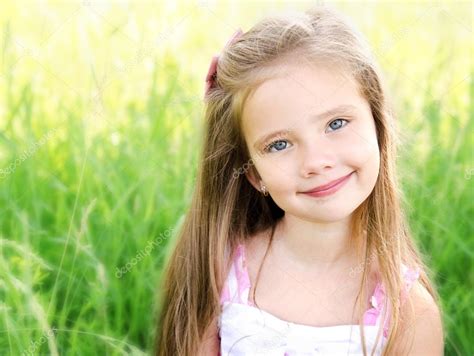 Portrait Of Adorable Smiling Little Girl — Stock Photo © Svetamart