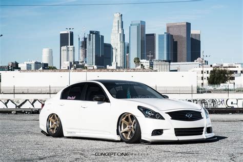 White Stanced Inifniti G37 Slammed And Enriched With Carbon Fiber Lip