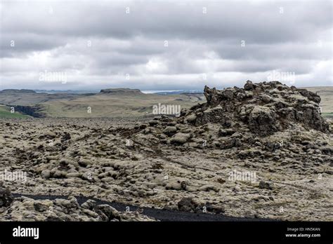 Epic Surreal Landscape In Iceland With Green Grass And Rocks Stock