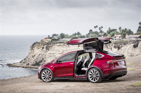 Tesla Model X Electric Meets Extravagantwith Gull Wing Doors And