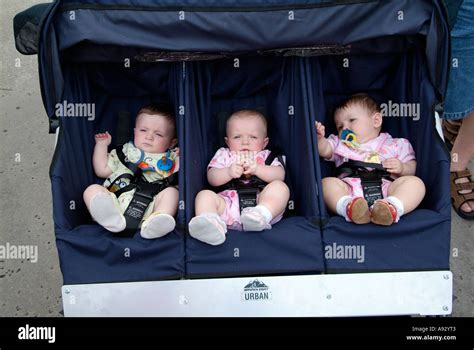 Parents With Baby Triplets Twins Visit Downtown Disney Marketplace