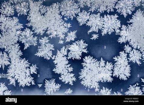 Winter Ice Crystals On Window Glass Macro Closeup Stock Photo Alamy