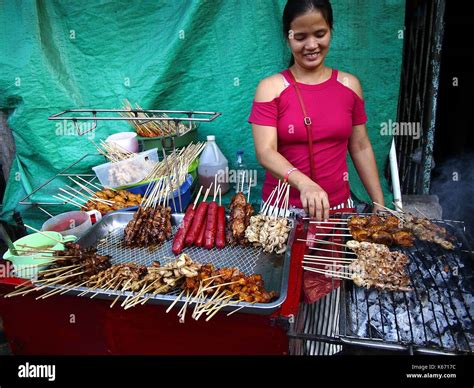 Antipolo City Philippines September 7 2017 A Street Food Vendor Grills Assorted Snack Items