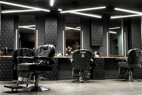 Here S A Modern Barber Shop Design It S Very Masculine With The Black Walls And Chairs C