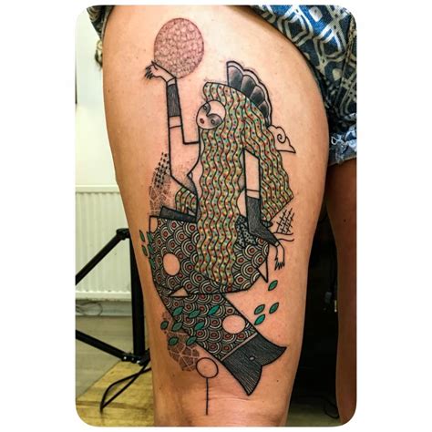 Illustrative Mermaid Tattoo On The Right Thigh