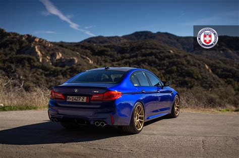 Hmmm so if i had two of my exact car.one on 19s and one on 17s the 17 car would win ay? San Marino Blue BMW M5 with HRE RC104 Wheels in Satin Gold | i NEW CARS