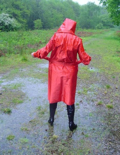 rain lovely rain janet in her red rubberized and hooded satin mackintosh raincoat