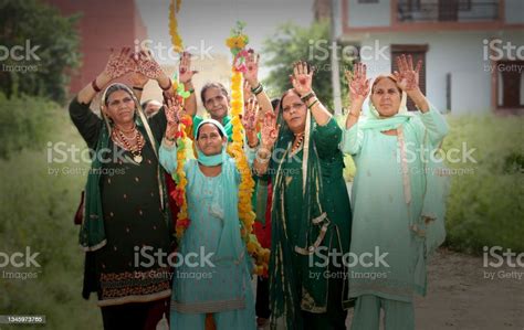 Medium Group Of Mature Females Celebrating Teej Festival And Enjoying