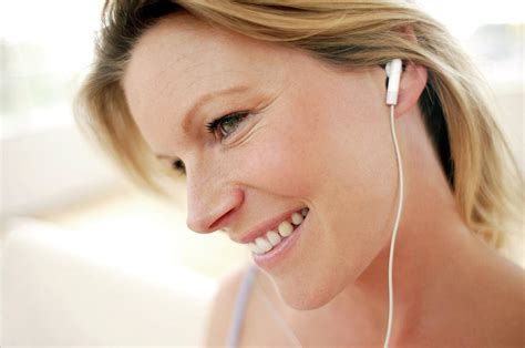 Woman Listening To Music Photograph By Ian Hootonscience Photo Library